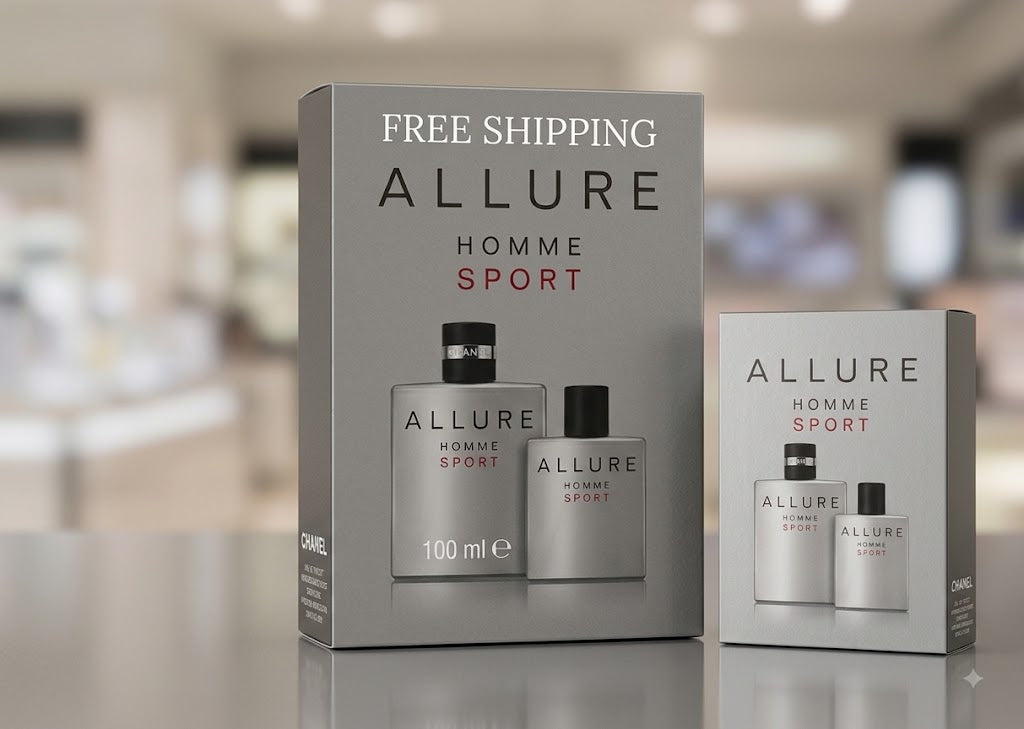 Allure Homme Sport cologne set in a silver-gray box, featuring two matching spray bottles with black caps, displayed on a reflective surface with a blurred store background.