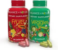 Two dietary supplement bottles labeled 'Fruits' and 'Veggies' with colorful graphics on a white background.